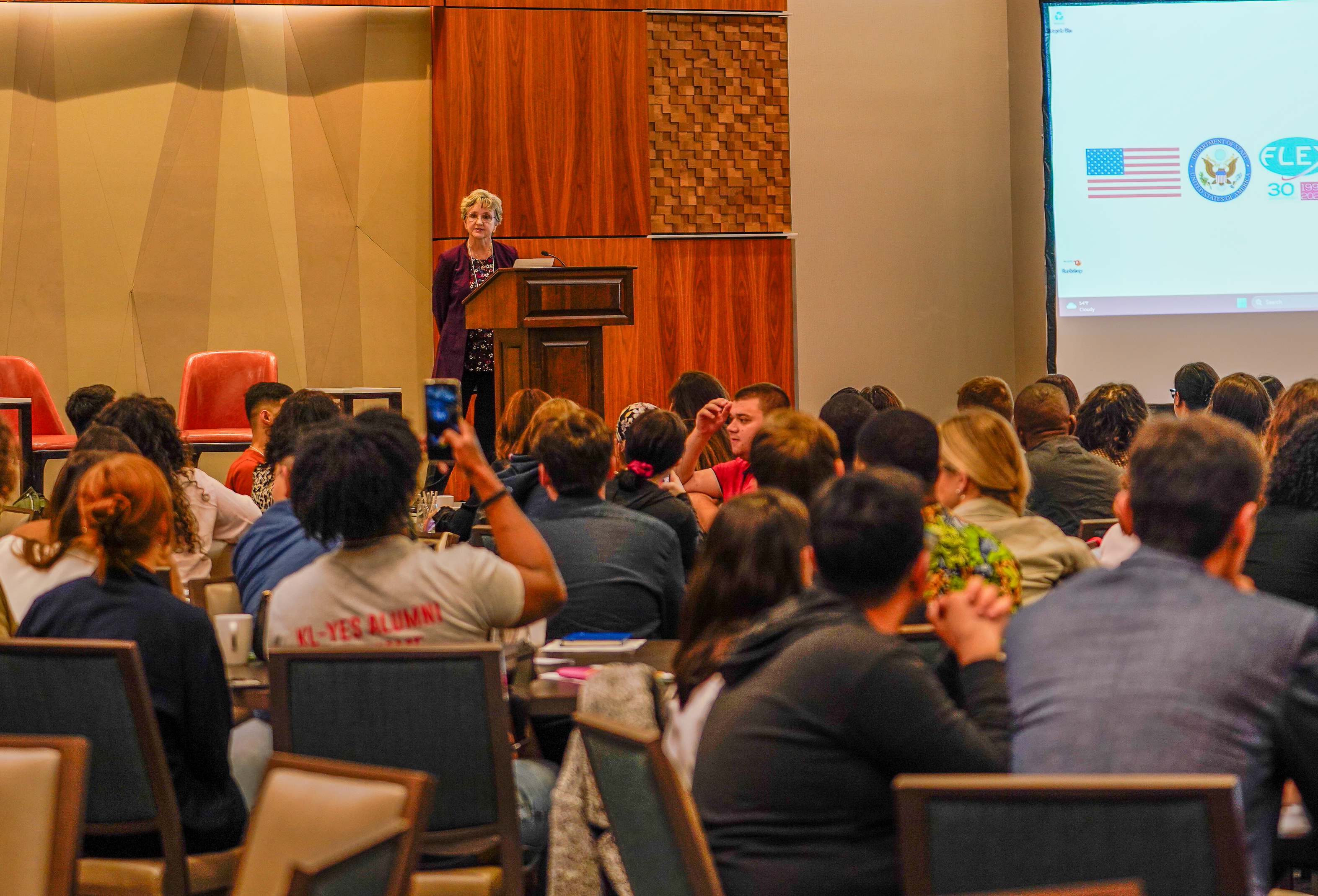 Lisa giving a speech_AC